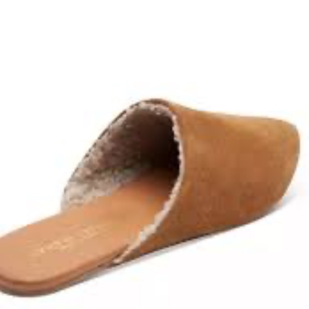 André Assous shearling fur lined mules.